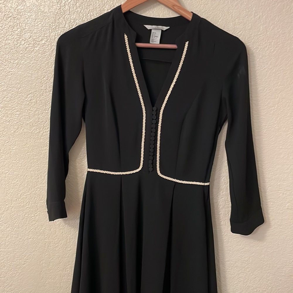 Black dress with button details
